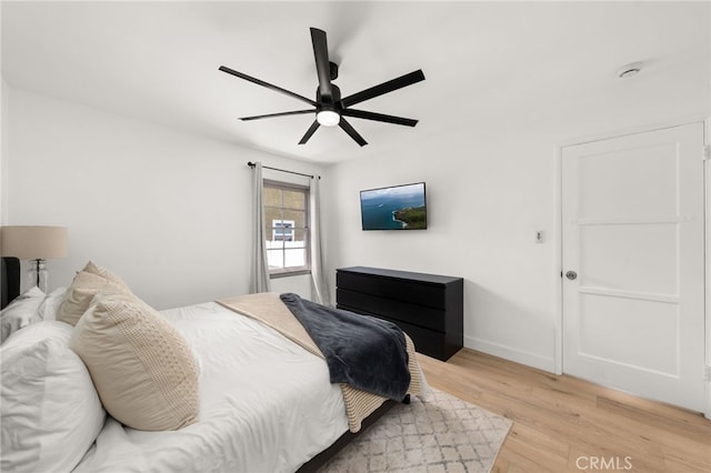 1326 Clock Ave, Redlands, CA 92374 - bedroom with light wood-style floors, baseboards, and ceiling fan