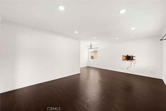 interior space with crown molding, recessed lighting, baseboards, and dark wood finished floors