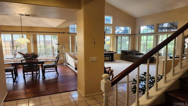 42154 Thoroughbred Ln, Murrieta, CA 92562 - stairs featuring healthy amount of natural light, tile patterned flooring, and lofted ceiling