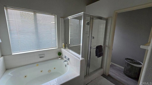 42154 Thoroughbred Ln, Murrieta, CA 92562 - bathroom with a stall shower, a tub with jets, and wood finished floors