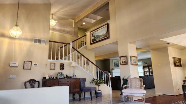 42154 Thoroughbred Ln, Murrieta, CA 92562 - living room with a towering ceiling and stairs