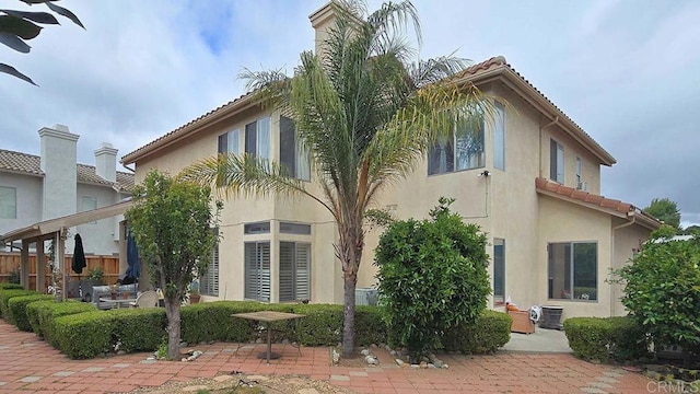 42154 Thoroughbred Ln, Murrieta, CA 92562 - view of home's exterior with a patio area, stucco siding, and a tiled roof