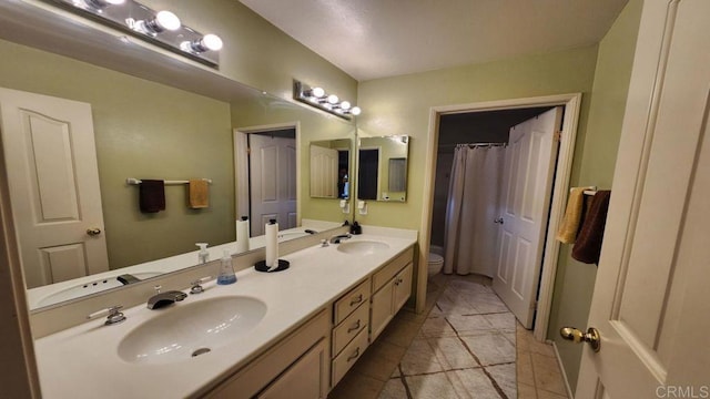 42154 Thoroughbred Ln, Murrieta, CA 92562 - full bath featuring double vanity, a shower with curtain, and tile patterned flooring