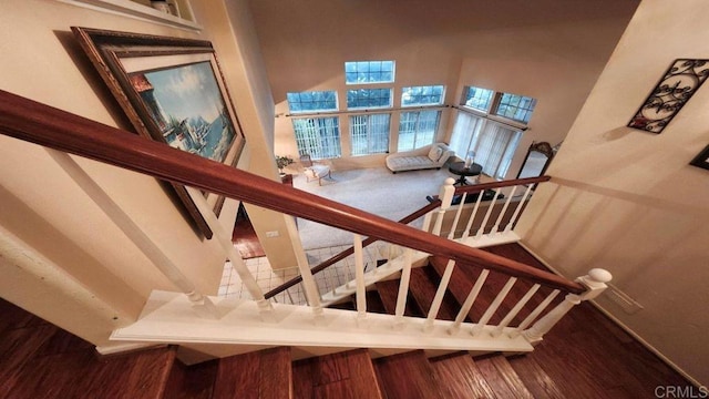 42154 Thoroughbred Ln, Murrieta, CA 92562 - stairway featuring a high ceiling and wood finished floors
