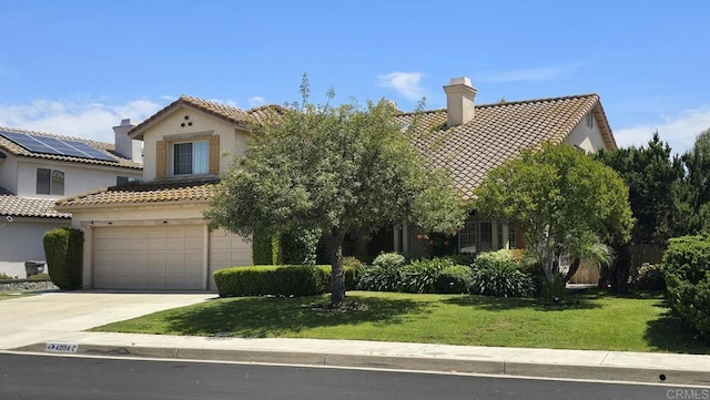 42154 Thoroughbred Ln, Murrieta, CA 92562 - view of front of property with concrete driveway, a tile roof, a garage, and stucco siding
