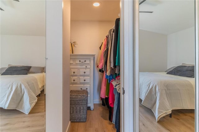 bedroom with baseboards and light wood-style floors