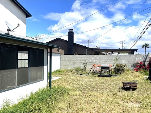 view of yard featuring fence
