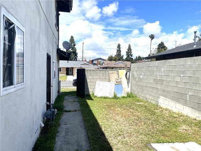 view of yard with a fenced backyard