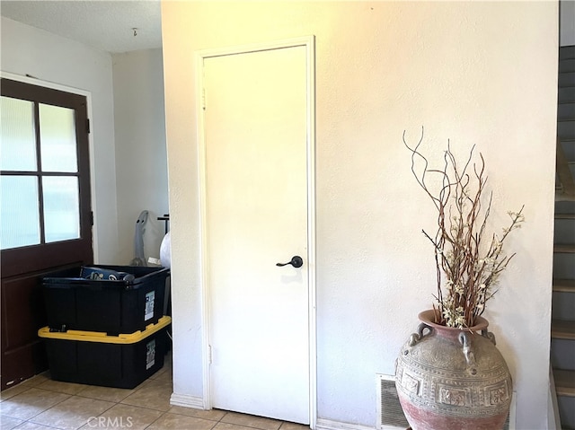interior space featuring tile patterned flooring