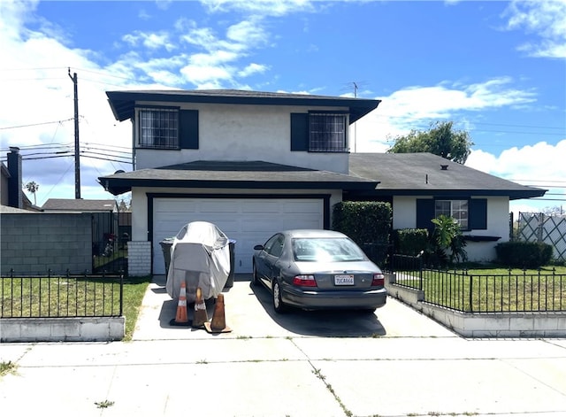 view of front of property featuring an attached garage, stucco siding, a front yard, and concrete driveway