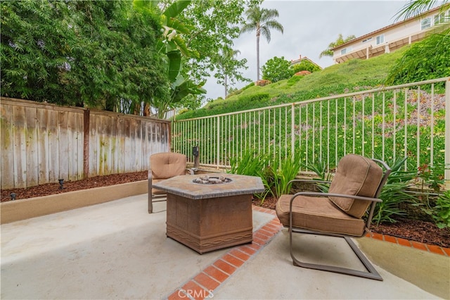 56 Egret Ln, Aliso Viejo, CA 92656 - fenced backyard with a patio area and a fire pit