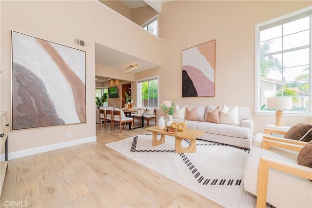 56 Egret Ln, Aliso Viejo, CA 92656 - living area featuring wood finished floors and baseboards