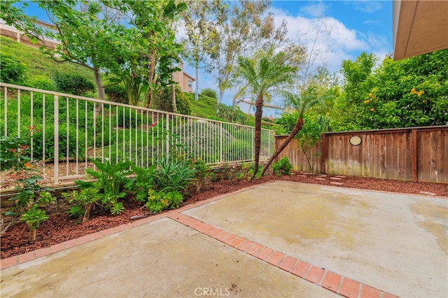 view of patio featuring a fenced backyard