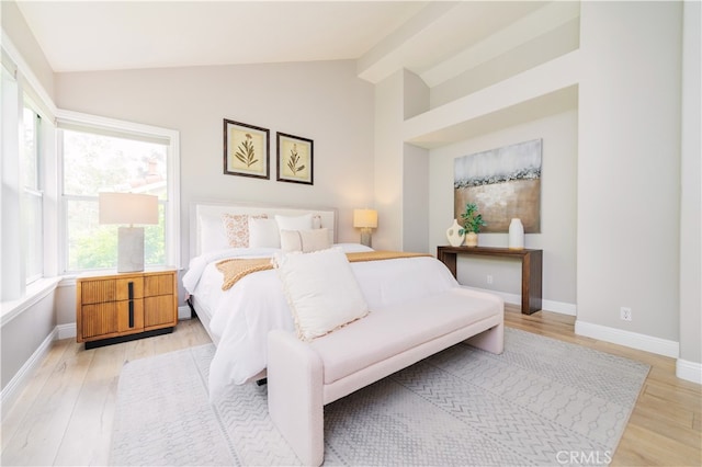 56 Egret Ln, Aliso Viejo, CA 92656 - bedroom with vaulted ceiling, light wood-type flooring, and baseboards