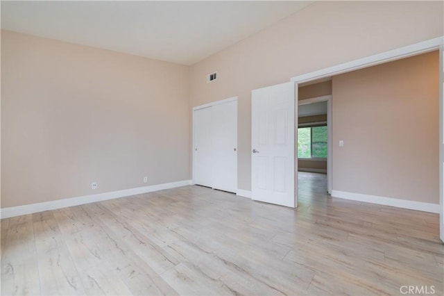 56 Egret Ln, Aliso Viejo, CA 92656 - spare room featuring light wood-type flooring and baseboards