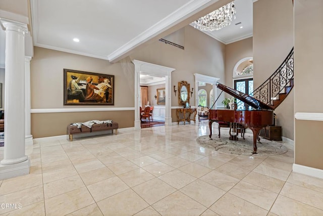 entrance foyer with crown molding, tile patterned floors, baseboards, ornate columns, and recessed lighting