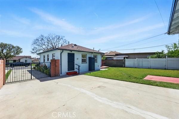 325 W Floral Dr, Monterey Park, CA 91754 - exterior space featuring a gate, fence, and driveway