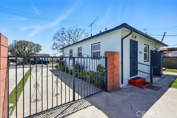 325 W Floral Dr, Monterey Park, CA 91754 - view of gate featuring fence and entry steps