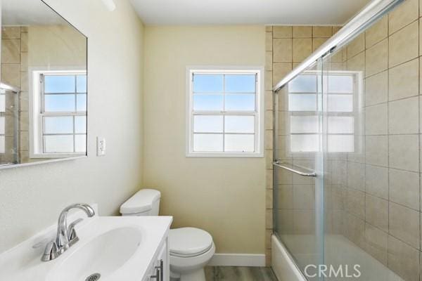 325 W Floral Dr, Monterey Park, CA 91754 - full bath featuring toilet, combined bath / shower with glass door, and vanity