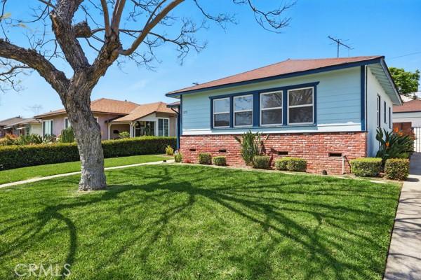 325 W Floral Dr, Monterey Park, CA 91754 - view of front of house with brick siding and a front yard