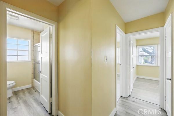 325 W Floral Dr, Monterey Park, CA 91754 - corridor featuring light wood-style floors and baseboards