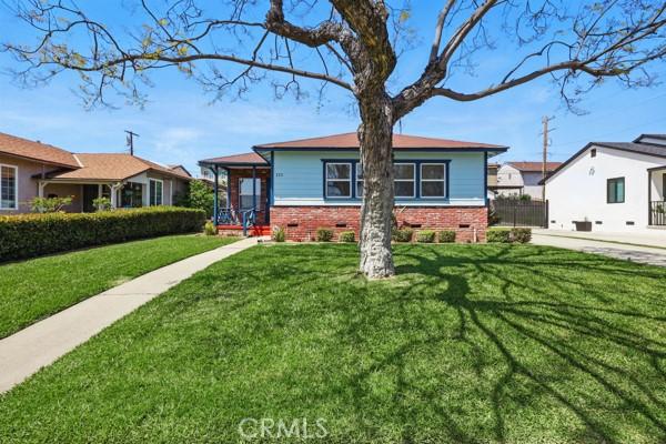 325 W Floral Dr, Monterey Park, CA 91754 - bungalow featuring brick siding, crawl space, and a front yard
