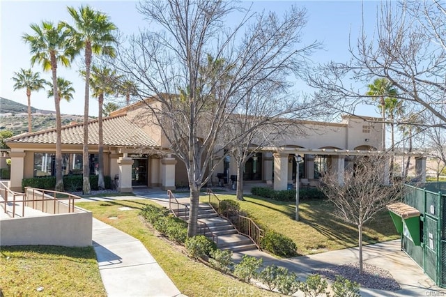 429 Indian Wells Rd, Banning, CA 92220 - view of front of home with stucco siding and a front yard