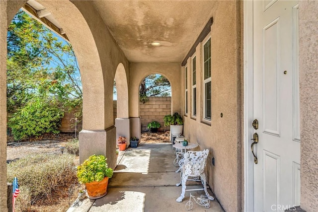 view of patio / terrace featuring fence