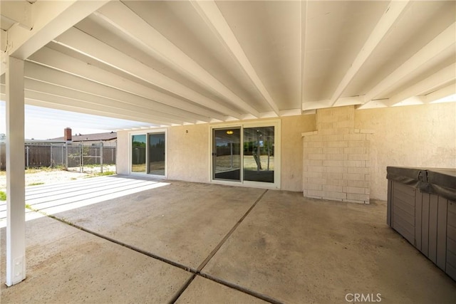 view of patio / terrace featuring fence