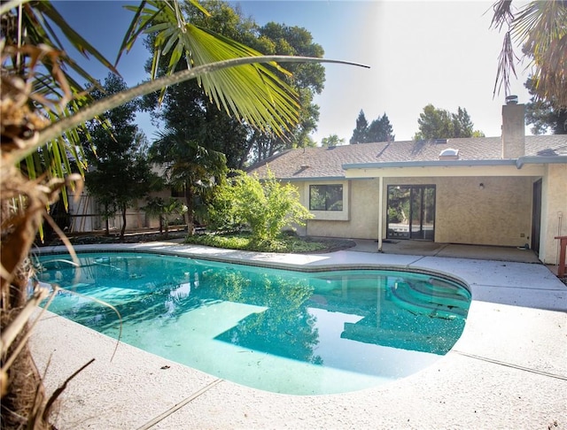 view of pool featuring a fenced in pool and a patio area