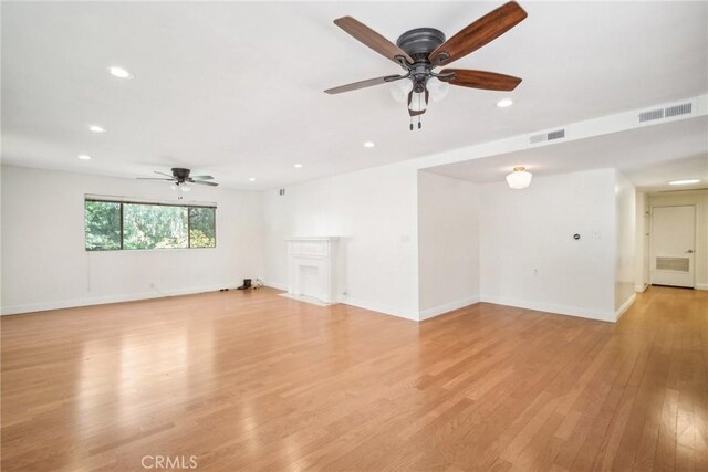 empty room featuring a ceiling fan, recessed lighting, and visible vents