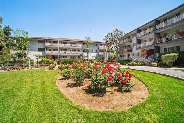 12031 Beverly Blvd Unit 1D, Whittier, CA 90601 - view of home's community featuring a lawn