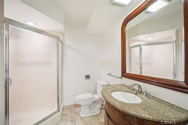 bathroom featuring toilet and a shower stall