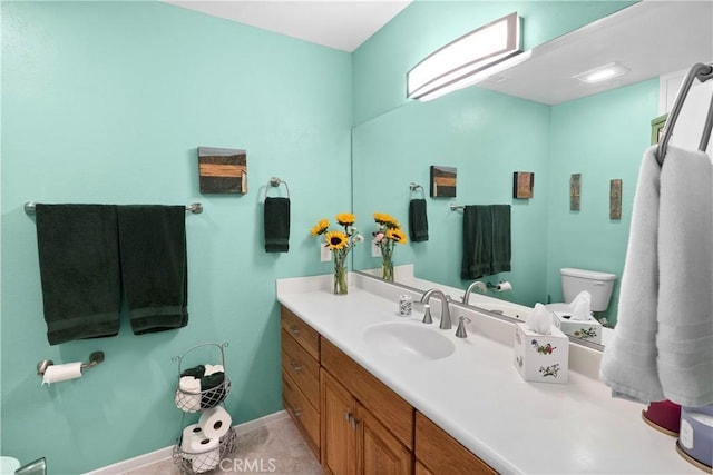 5410 Via, San Jacinto, Riverside, CA 92506 - bathroom with vanity, toilet, and baseboards
