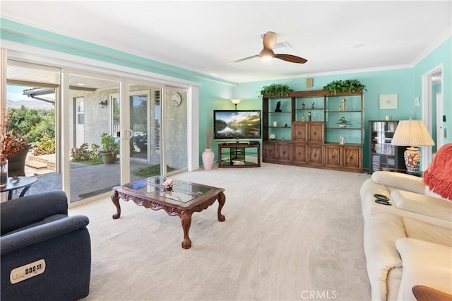 5410 Via, San Jacinto, Riverside, CA 92506 - living room with ornamental molding, french doors, a ceiling fan, and light colored carpet