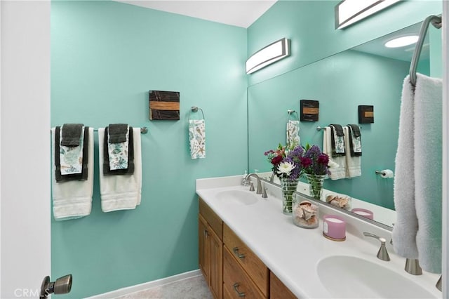 5410 Via, San Jacinto, Riverside, CA 92506 - bathroom featuring double vanity and baseboards