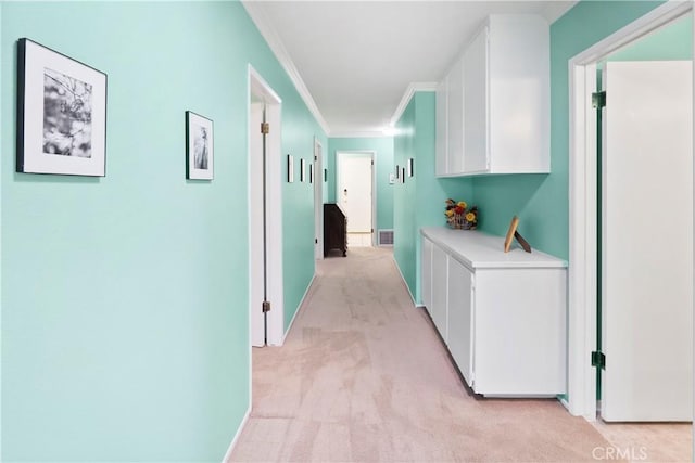 5410 Via, San Jacinto, Riverside, CA 92506 - corridor with ornamental molding, light carpet, and baseboards