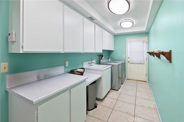 5410 Via, San Jacinto, Riverside, CA 92506 - clothes washing area featuring cabinet space, washing machine and clothes dryer, and light tile patterned flooring