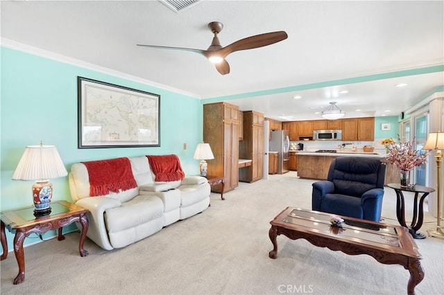 5410 Via, San Jacinto, Riverside, CA 92506 - living area featuring light colored carpet, ornamental molding, a ceiling fan, and recessed lighting