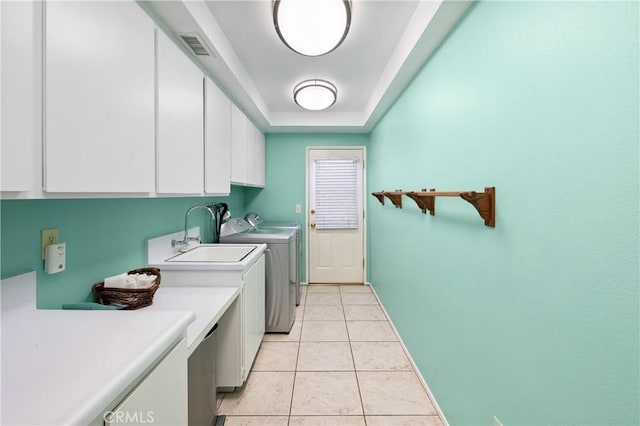 5410 Via, San Jacinto, Riverside, CA 92506 - laundry area featuring cabinet space, washer and dryer, light tile patterned flooring, and baseboards