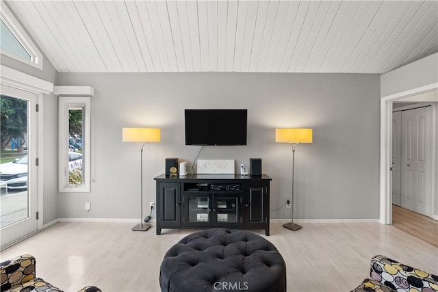 living area featuring baseboards, wooden ceiling, wood finished floors, and lofted ceiling