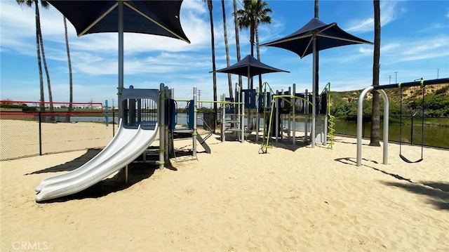 community jungle gym with a water view