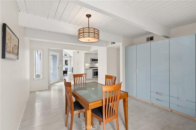 dining room featuring light wood-style floors, baseboards, wooden ceiling, beamed ceiling, and visible vents