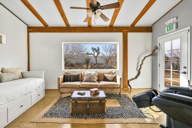 7423 Juniper Rd, Joshua Tree, CA 92252 - living area with ceiling fan, lofted ceiling with beams, and light wood-style floors