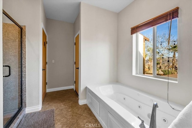 7423 Juniper Rd, Joshua Tree, CA 92252 - full bathroom featuring a tub with jets, baseboards, tile patterned floors, and a shower stall