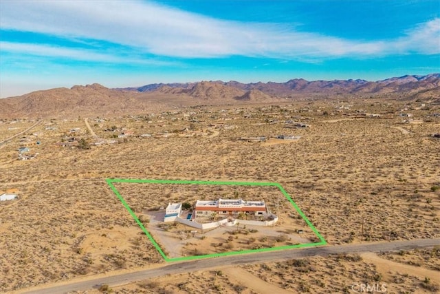 7423 Juniper Rd, Joshua Tree, CA 92252 - drone / aerial view featuring a mountain view and a desert view