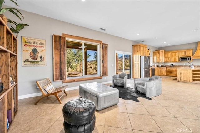 7423 Juniper Rd, Joshua Tree, CA 92252 - living area featuring light tile patterned floors, baseboards, recessed lighting, and visible vents