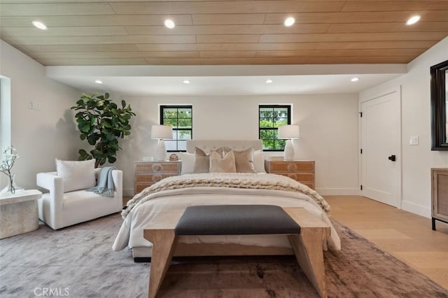bedroom with wood ceiling, light wood finished floors, and recessed lighting