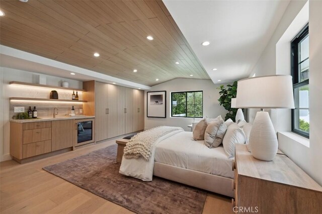 13817 Valley Vista Blvd, Sherman Oaks, CA 91423 - bedroom with wet bar, light wood finished floors, vaulted ceiling, wood ceiling, and recessed lighting