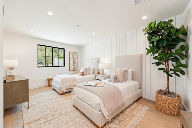 bedroom featuring recessed lighting, visible vents, and light wood finished floors